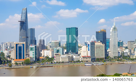 Aerial View Of Ho Chi MInh City Skyline With Buildings In Central And Saigon River, Vietnam. Aerial View Of Ho Chi MInh City Skyline With Buildings In Central And Saigon River, Vietnam. 140065763