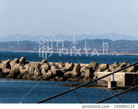 A breakwater lined with wind turbines near Kanoura Fishing Port in Akita Prefecture A breakwater lined with wind turbines near Kanoura Fishing Port in Akita Prefecture 140066114