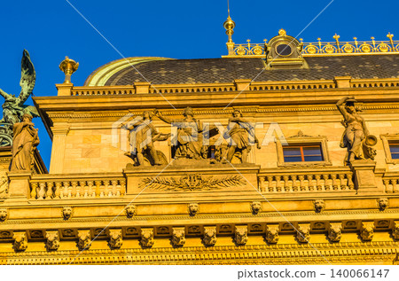 Sculptural frieze and decorative facade detail of National Theatre in golden afternoon light, Prague, Czech Republic Sculptural frieze and decorative facade detail of National Theatre in golden afternoon light, Prague, Czech Republic 140066147