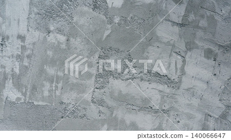 Rough grey concrete wall texture with trowel marks. Raw cement surface 140066647