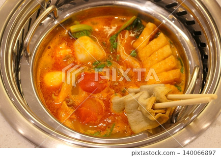 Chinese Hot Pot with Spicy Broth and Fresh Ingredients Chinese Hot Pot with Spicy Broth and Fresh Ingredients 140066897