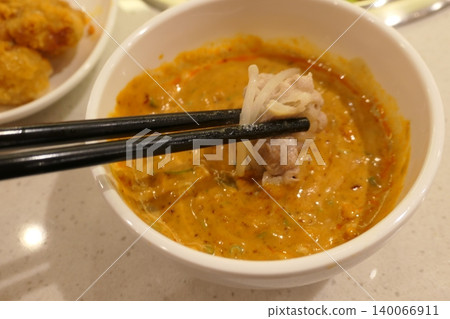 Chinese Hot Pot with Spicy Broth and Fresh Ingredients Chinese Hot Pot with Spicy Broth and Fresh Ingredients 140066911
