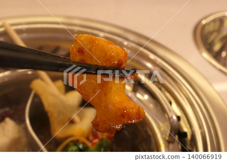 Chinese Hot Pot with Spicy Broth and Fresh Ingredients Chinese Hot Pot with Spicy Broth and Fresh Ingredients 140066919