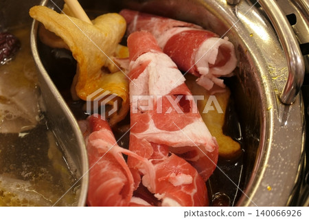 Chinese Hot Pot with Spicy Broth and Fresh Ingredients Chinese Hot Pot with Spicy Broth and Fresh Ingredients 140066926