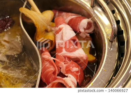 Chinese Hot Pot with Spicy Broth and Fresh Ingredients Chinese Hot Pot with Spicy Broth and Fresh Ingredients 140066927