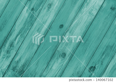 Turquoise colored painted wooden board with diagonal planks texture, rustic wall surface, background Turquoise colored painted wooden board with diagonal planks texture, rustic wall surface, background 140067102