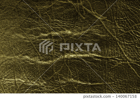 Detailed khaki colored wrinkled textured leather with natural creases texture background Detailed khaki colored wrinkled textured leather with natural creases texture background 140067158