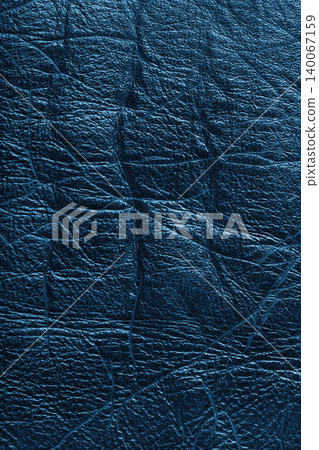 Detailed texture background of blue colored wrinkled metallic leather with natural creases Detailed texture background of blue colored wrinkled metallic leather with natural creases 140067159