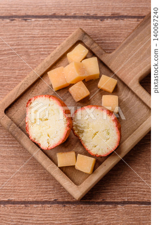 Aged Belper Knolle cheese with jam, crackers, and nuts. Belper Knolle cheese 140067240