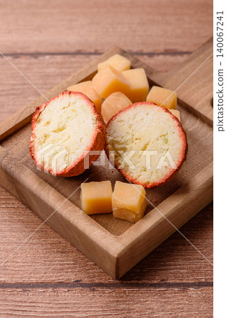 Aged Belper Knolle cheese with jam, crackers, and nuts. Belper Knolle cheese Aged Belper Knolle cheese with jam, crackers, and nuts. Belper Knolle cheese 140067241