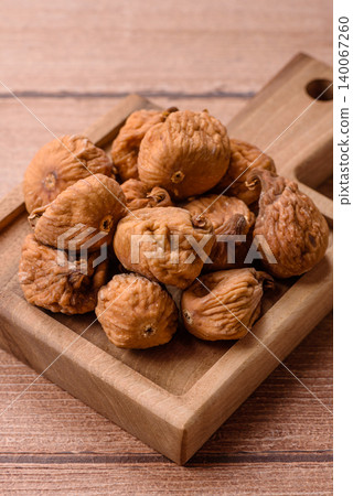 Dried whole fig as an ingredient for sweet desserts. Dried figs as a food Dried whole fig as an ingredient for sweet desserts. Dried figs as a food 140067260