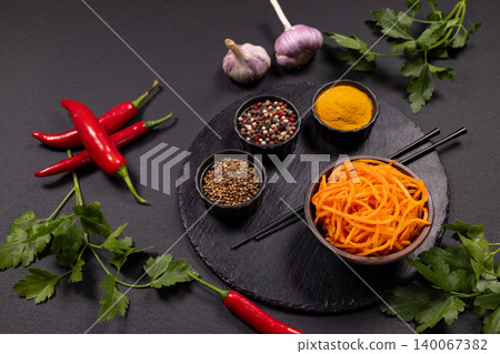 Korean carrot salad with spices and red chili 140067382