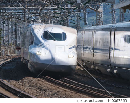 Tokaido Shinkansen passing through Odawara Station Tokaido Shinkansen passing through Odawara Station 140067863