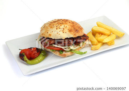 Delicious Turkish Kofte Sandwich (meatballs) isolated white background Delicious Turkish Kofte Sandwich (meatballs) isolated white background 140069097