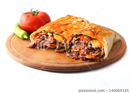 Doner kebab or shawarma sandwich isolated on white background Doner kebab or shawarma sandwich isolated on white background 140069185