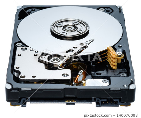 a computer's hard disk HDD data storage drive without a shield isolated in a white background shows magnetic disc and electronic parts inside a computer's hard disk HDD data storage drive without a shield isolated in a white background shows magnetic disc and electronic parts inside 140070098