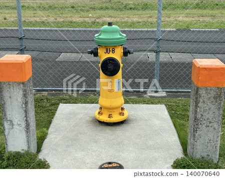 Yellow fire hydrant 140070640