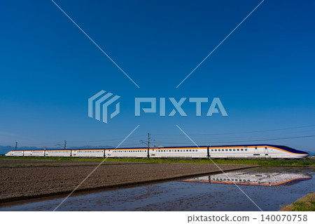 Yamagata Shinkansen reflected in the water 140070758