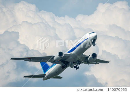 An airplane taking off towards its destination. An airplane taking off towards its destination. 140070963