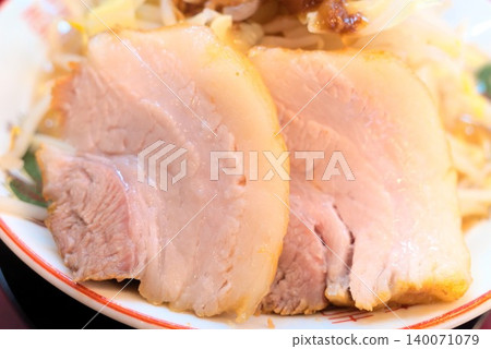 Thick-cut char siu, a convenient addition to ramen shop menus, is included in Jiro-style ramen. 140071079