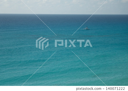 A beautiful view of the Caribbean beach from the balcony of a resort hotel in Cancun, Mexico. A beautiful view of the Caribbean beach from the balcony of a resort hotel in Cancun, Mexico. 140071222