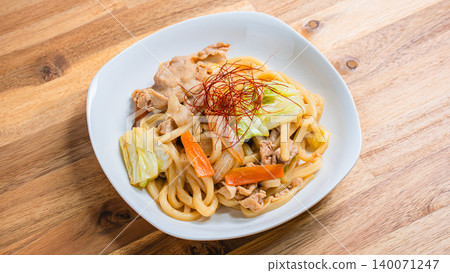 Miso-grilled udon: A photo of a Japanese-style udon dish with stir-fried pork and vegetables. Miso-grilled udon: A photo of a Japanese-style udon dish with stir-fried pork and vegetables. 140071247