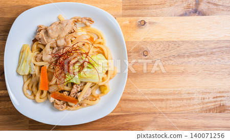 Miso-grilled udon: A photo of a Japanese-style udon dish with stir-fried pork and vegetables. Miso-grilled udon: A photo of a Japanese-style udon dish with stir-fried pork and vegetables. 140071256