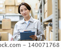Middle-aged female worker in a warehouse 140071768