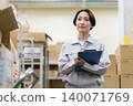 Middle-aged female worker in a warehouse 140071769