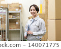 Middle-aged female worker in a warehouse 140071775