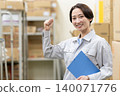 Middle-aged female worker in a warehouse 140071776