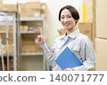 Middle-aged female worker in a warehouse 140071777