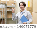 Middle-aged female worker in a warehouse 140071779