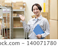 Middle-aged female worker in a warehouse 140071780