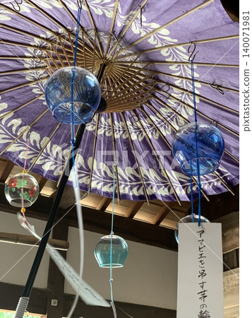 A colorful scene of wind chimes swaying at the wind chime festival at Kasuga Shrine in Wakayama. A colorful scene of wind chimes swaying at the wind chime festival at Kasuga Shrine in Wakayama. 140071981