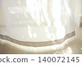Soft shadows cast through curtains; a background material for natural interiors. 140072145