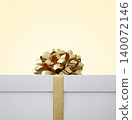 A gift with a golden ribbon, creating a luxurious and sophisticated image. 140072146