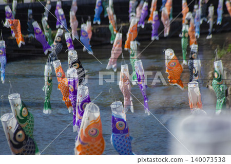 A carp streamer with a spiral pattern sways in the wind. A carp streamer with a spiral pattern sways in the wind. 140073538