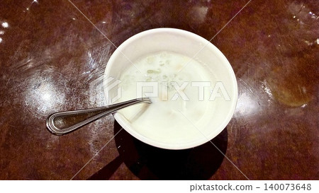 A Thai-style dessert made with coconut milk and nata de coco. 140073648