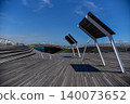 Under the blue sky, on the wooden deck of Osanbashi Pier in Yokohama Port. 140073652