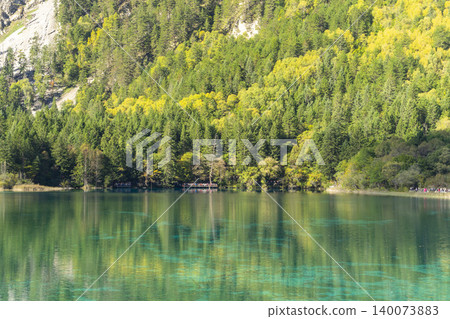 Beautiful view of the Panda Lake at the Rize Valley in Jiuzhaigou nature reserve (Jiuzhai Valley National Park), China Beautiful view of the Panda Lake at the Rize Valley in Jiuzhaigou nature reserve (Jiuzhai Valley National Park), China 140073883