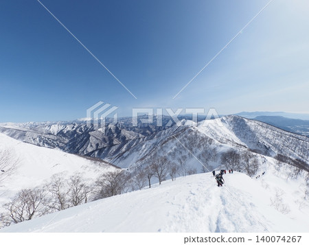 Mount Tanigawa in mid-February (Minakami Town, Gunma Prefecture and Yuzawa Town, Niigata Prefecture) 140074267
