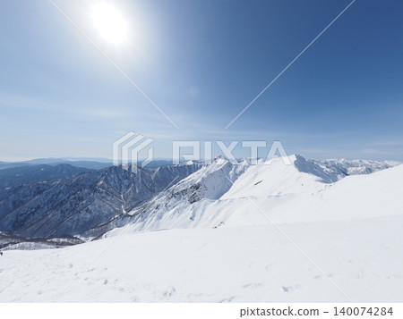 Mount Tanigawa in mid-February (Minakami Town, Gunma Prefecture and Yuzawa Town, Niigata Prefecture) 140074284