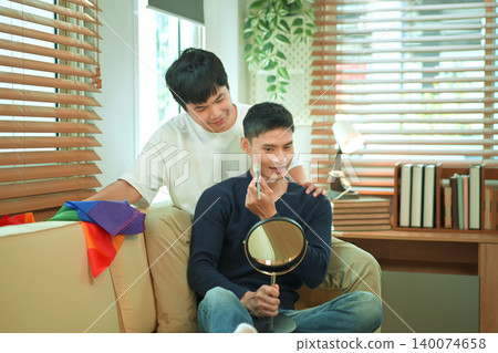 LGBTQ partners sharing beauty routine together LGBTQ partners sharing beauty routine together 140074658