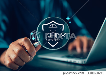 Professional work safety compliance first shield workplace health icons appear through magnifying glass, ensuring industrial protection and occupational risk management standards Professional work safety compliance first shield workplace health icons appear through magnifying glass, ensuring industrial protection and occupational risk management standards 140074693