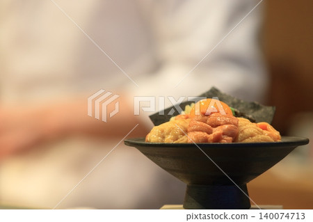 A large serving of sea urchin rice bowl A large serving of sea urchin rice bowl 140074713