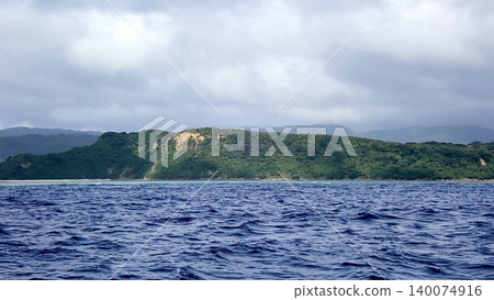Subtropical mountains and the blue sea stretch across the secluded Oku-Iriomote Island. Subtropical mountains and the blue sea stretch across the secluded Oku-Iriomote Island. 140074916