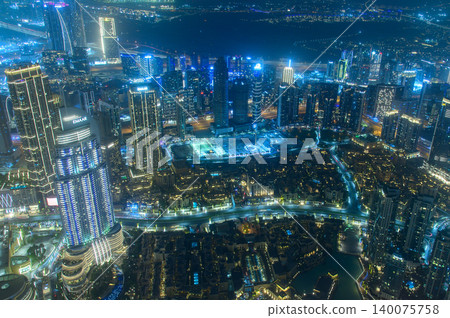 A stunning night view of Dubai in the UAE, viewed from the observation deck of a skyscraper. A stunning night view of Dubai in the UAE, viewed from the observation deck of a skyscraper. 140075758