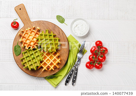 Green vegan spinach waffles top view 140077439