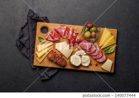 Cheese and meat antipasti platter Cheese and meat antipasti platter 140077444